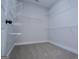 Carpeted walk-in closet providing ample space with wire shelving for storage at 3264 Greenhill Ct, Villa Rica, GA 30180