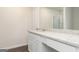 Bathroom featuring a vanity with granite countertops and stainless steel faucet at 928 Hesston Dr, Locust Grove, GA 30248