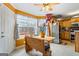 Eat-in kitchen with stainless steel appliances and wooden cabinets is bright and inviting at 10 Allen Oaks Way, Covington, GA 30016