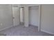 Bedroom featuring neutral paint, carpet flooring, and a closet at 2401 Northlake Ct, Atlanta, GA 30345