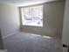 Cozy bedroom featuring neutral paint and a window that offers lots of natural light at 2401 Northlake Ct, Atlanta, GA 30345