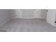 Bedroom with neutral carpeting and two closets featuring double doors at 2401 Northlake Ct, Atlanta, GA 30345