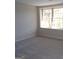Bedroom with natural light and neutral walls at 2401 Northlake Ct, Atlanta, GA 30345
