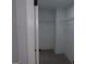 Walk in closet with neutral paint and shelving at 2401 Northlake Ct, Atlanta, GA 30345