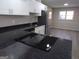 Modern kitchen with granite countertops, stainless steel appliances and island cooktop at 2401 Northlake Ct, Atlanta, GA 30345