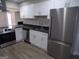 Modern kitchen featuring stainless steel appliances and white cabinets at 2401 Northlake Ct, Atlanta, GA 30345
