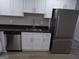 Modern kitchen featuring stainless steel appliances, granite countertops and white cabinets at 2401 Northlake Ct, Atlanta, GA 30345