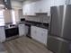 Modern kitchen featuring stainless steel appliances and white cabinets at 2401 Northlake Ct, Atlanta, GA 30345
