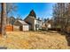 Wide backyard featuring a wooden fence and a home's exterior at 2561 Rainover Ct, Decatur, GA 30034