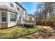 Backyard view with a deck and grass at 2561 Rainover Ct, Decatur, GA 30034