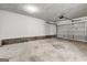 Spacious two-car garage with garage door opener and concrete floor at 2561 Rainover Ct, Decatur, GA 30034