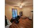 Bedroom with ceiling fan, hardwood floors, and a closet at 4748 Ash St, Doraville, GA 30340