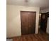 Bedroom with closet, hardwood floors, and views to hallway at 4748 Ash St, Doraville, GA 30340