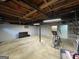 Spacious unfinished basement with concrete floor and exposed ceiling at 3370 Creek Hollow Dr, Marietta, GA 30062