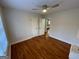 Bedroom with hardwood floors, ceiling fan, two closets, and light colored walls at 3370 Creek Hollow Dr, Marietta, GA 30062