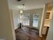 Bright breakfast nook featuring hardwood floors and a door leading to the backyard at 3370 Creek Hollow Dr, Marietta, GA 30062