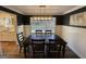 Elegant dining room with a modern chandelier, and a large window offering natural light at 3370 Creek Hollow Dr, Marietta, GA 30062