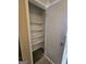 Linen closet featuring multiple shelves for optimal storage and organization space at 245 Kim Trail, Stockbridge, GA 30281