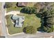 Bird's eye view of a home on a large lot with a curved driveway and mature landscaping at 1000 Maria Dr, Mcdonough, GA 30253