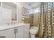 Full bathroom with shower-tub combination and white vanity with chrome fixtures at 3216 Pheasant Dr, Decatur, GA 30034