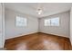 Bedroom with hardwood floors, ceiling fan and lots of natural light at 3216 Pheasant Dr, Decatur, GA 30034