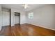 Bedroom with hardwood floors, ceiling fan and a closet at 3216 Pheasant Dr, Decatur, GA 30034