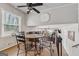 Bright breakfast nook features a wrought iron table with views to the living room at 3216 Pheasant Dr, Decatur, GA 30034