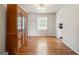 Dining room featuring hardwood floors and a vintage cabinet at 3216 Pheasant Dr, Decatur, GA 30034