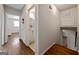 Hallway with hardwood floors leading to the bathroom and bedroom at 3216 Pheasant Dr, Decatur, GA 30034