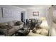 Inviting living room featuring hardwood floors, neutral color scheme, modern furniture, and natural light creates a welcoming atmosphere at 5142 Rock Eagle Dr, Stone Mountain, GA 30083