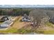 Long aerial shot of house and backyard, complete with plane at 3403 Bill Gardner Pkwy, Locust Grove, GA 30248