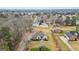 Neighborhood aerial view featuring tree-lined streets and well-manicured lawns at 3403 Bill Gardner Pkwy, Locust Grove, GA 30248