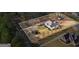 Overhead view of property highlighting the house, its surrounding yard and the adjacent street at 3403 Bill Gardner Pkwy, Locust Grove, GA 30248