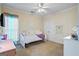 bedroom with closet, desk and twin bed at 3403 Bill Gardner Pkwy, Locust Grove, GA 30248