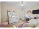bedroom with closet, desk and twin bed at 3403 Bill Gardner Pkwy, Locust Grove, GA 30248
