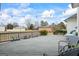View of the deck featuring string lights and comfortable seating, perfect for relaxing and enjoying the outdoor space at 3403 Bill Gardner Pkwy, Locust Grove, GA 30248