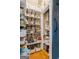 Well-organized pantry with ample shelving and storage for food and kitchen essentials at 3403 Bill Gardner Pkwy, Locust Grove, GA 30248