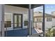 Cozy deck with grey wooden floors and wood trim with an elegant neighborhood view at 560 John Wesley Dobbs Ne Ave, Atlanta, GA 30312