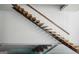 Unique floating staircase with wooden steps, metal frame and suspension cables at 560 John Wesley Dobbs Ne Ave, Atlanta, GA 30312