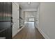 Inviting foyer with hardwood floors and an open view to the living space at 110 Warren Way, Fayetteville, GA 30215