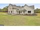 Charming home featuring a manicured lawn and well-maintained landscaping at 110 Warren Way, Fayetteville, GA 30215