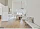 Bright and airy living room with high ceilings, hardwood floors, and stylish decor at 110 Warren Way, Fayetteville, GA 30215