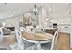 Open-concept living space with a dining area, kitchen, and living room; perfect for entertaining at 110 Warren Way, Fayetteville, GA 30215