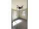 Neutral bedroom with new carpet, a window, and a modern ceiling fan at 95 Grove Creek Dr, Locust Grove, GA 30248