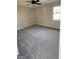 Neutral bedroom with new carpet, a window, and a modern ceiling fan at 95 Grove Creek Dr, Locust Grove, GA 30248