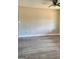 Open-concept living room with stylish new flooring and a fresh neutral color palette at 95 Grove Creek Dr, Locust Grove, GA 30248