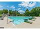 Large outdoor swimming pool with lane markers and ample seating at 6360 Brookline Ct, Cumming, GA 30040
