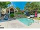 Community pool featuring a water slide and stone accents at 6360 Brookline Ct, Cumming, GA 30040
