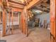 View of unfinished basement with shower and exposed framing at 150 Grove Creek Dr, Locust Grove, GA 30248