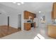 Efficient kitchen with matching appliances and flooring at 150 Grove Creek Dr, Locust Grove, GA 30248